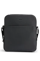 Reporter bag in grained Italian leather with embossed logo
