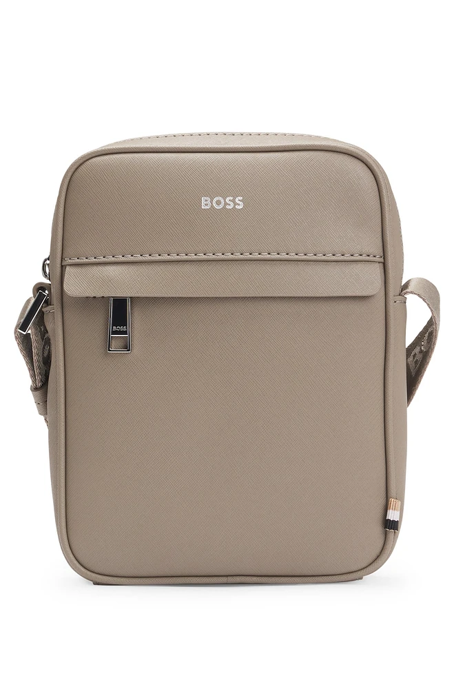 Reporter bag with signature stripe and logo detail