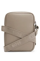 Reporter bag with signature stripe and logo detail