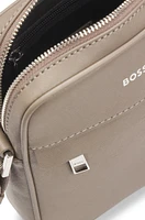 Reporter bag with signature stripe and logo detail