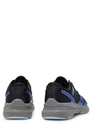 Mixed-material trainers with rubberized faux leather