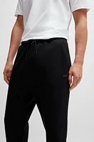 Stretch-cotton tracksuit bottoms with logo print