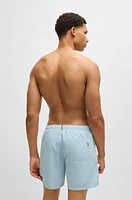 Fully lined swim shorts with logo print