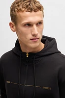 Zip-up hoodie with printed artwork