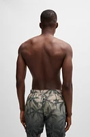Quick-dry swim shorts with seasonal print