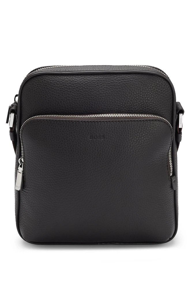 Reporter bag in grained Italian leather with embossed logo