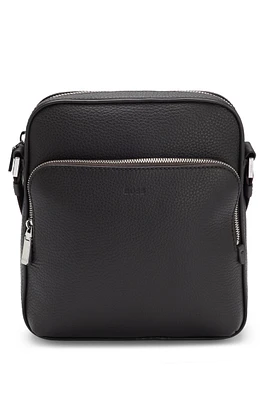 Reporter bag in grained Italian leather with embossed logo