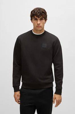 Sweatshirt with drop-needle stitching