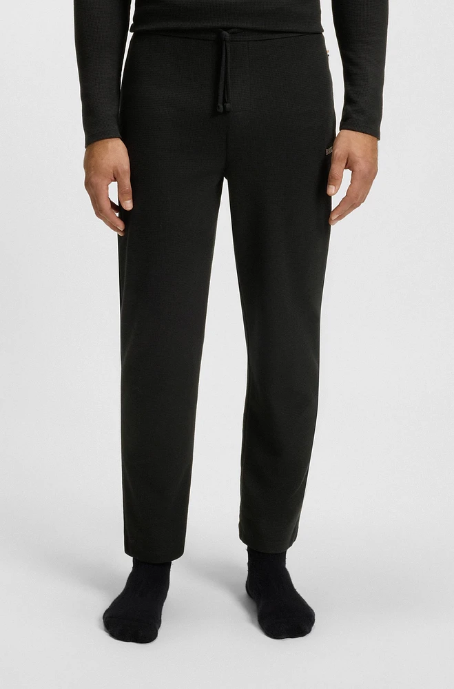 Pajama bottoms with embroidered logo