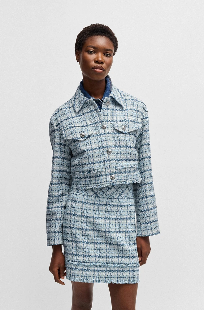 Cropped tweed jacket with metallic buttons