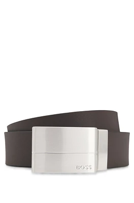 Reversible-leather belt with pin and plaque buckles