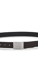 Reversible-leather belt with pin and plaque buckles