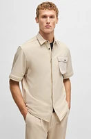 Relaxed-fit shirt with zip-off sleeves