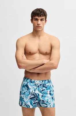 Printed swim shorts with logo detail
