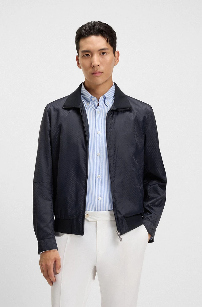 Water-repellent jacket with monogram jacquard