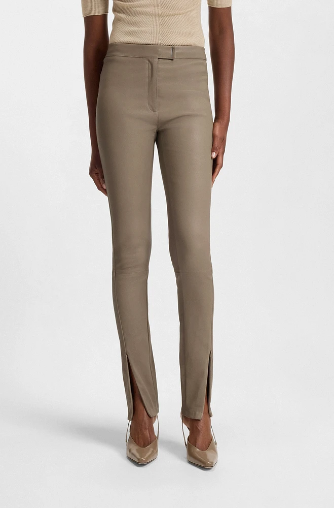 Leather leggings with logo-hook closure