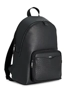 Backpack with monogram-patterned pocket