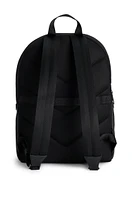 Backpack with monogram-patterned pocket