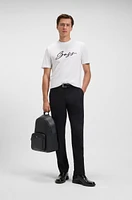 Backpack with monogram-patterned pocket
