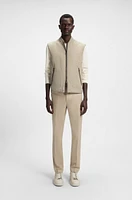 Water-repellent gilet with tonal binding