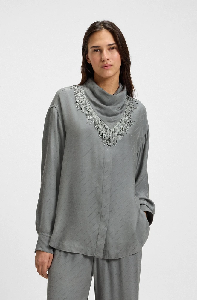 Oversize-fit blouse with logos and fringing