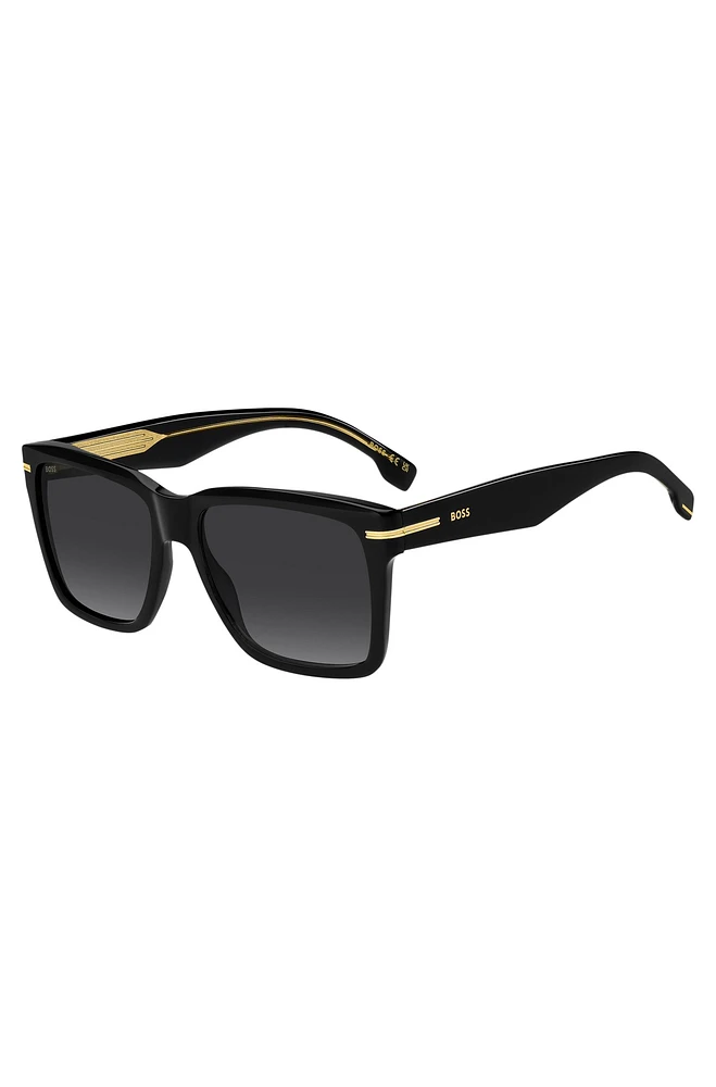 Black-acetate sunglasses with gold-tone trims
