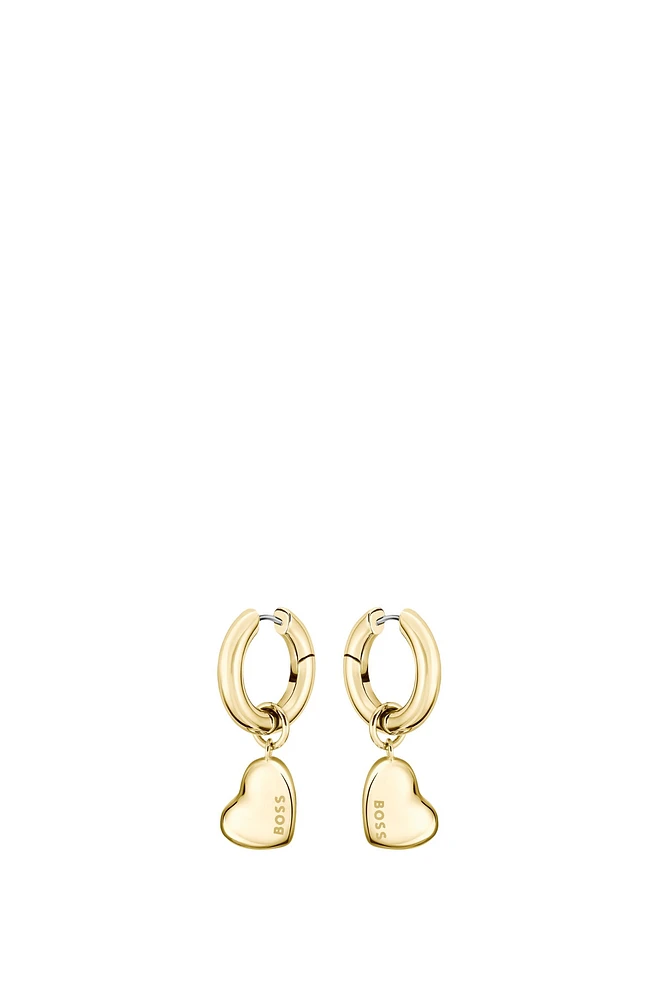 Gold-tone huggie hoop earrings with heart charms