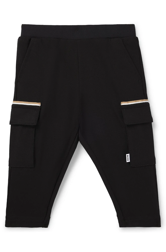 Kids' cargo trousers stretch piqué with logo label