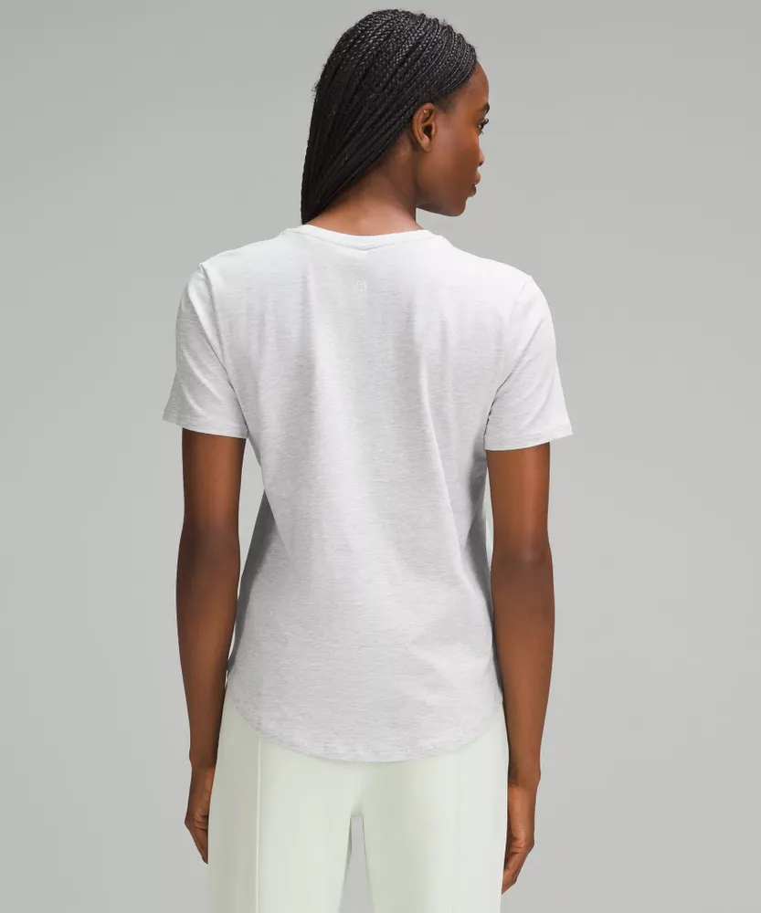 Love Curved-Hem Crewneck T-Shirt | Women's Short Sleeve Shirts & Tee's