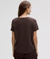 Love Curved-Hem Crewneck T-Shirt | Women's Short Sleeve Shirts & Tee's