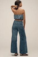 The Adi Patchwork Mid-Rise Flare Jeans by Pilcro