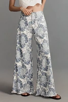 The Adi Printed Linen Mid-Rise Flare Pants by Pilcro