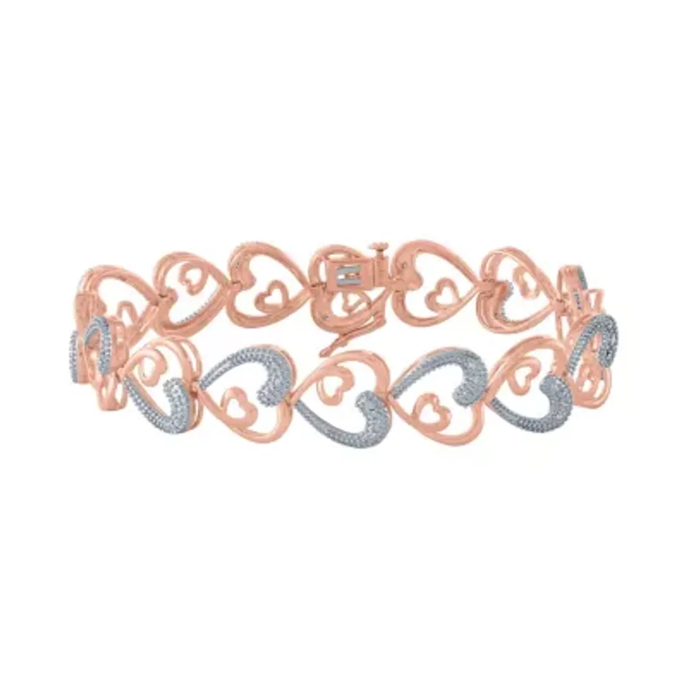 1/10 CT. T.W. Natural White Diamond Heart 7.5 Inch Tennis Bracelet in 14K Gold Over Silver