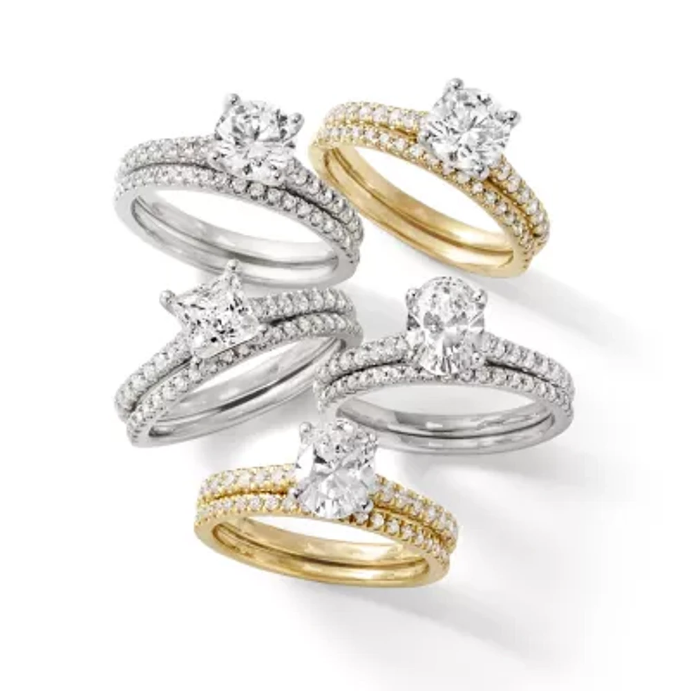 (H-I / Si2-I1) Womens 1 1/2 CT. T.W. Lab Grown White Diamond 10K or 14K Gold Oval Side Stone Bridal Set