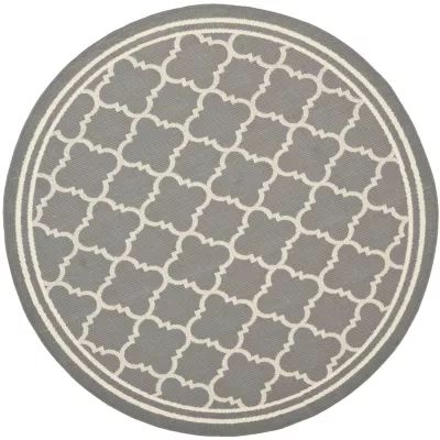 Safavieh Courtyard Collection Crispian Geometric Indoor/Outdoor Round Area Rug