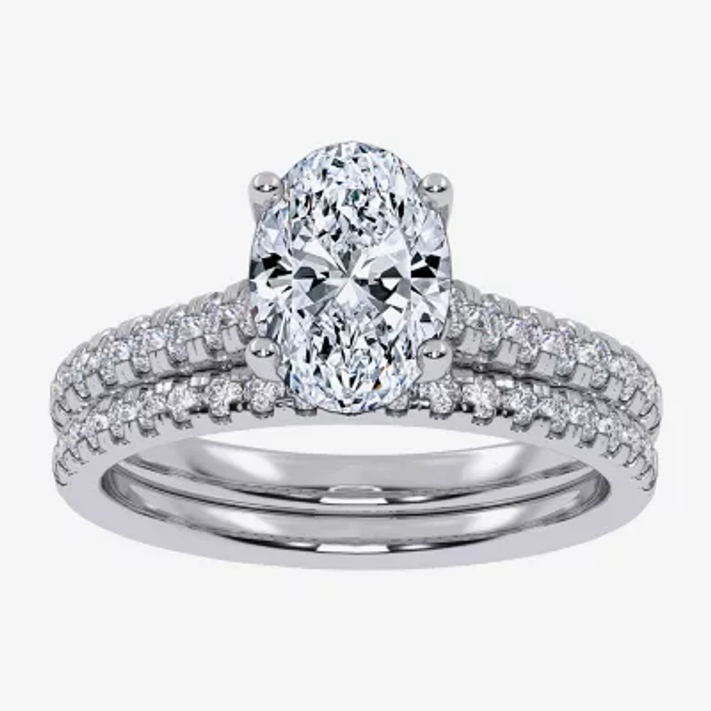 (H-I / Si2-I1) Womens 1 1/2 CT. T.W. Lab Grown White Diamond 10K or 14K Gold Oval Side Stone Bridal Set