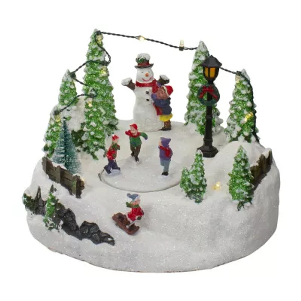 Northlight 9in Scene With Moving Skaters And A Snowman Plays Music Christmas Village