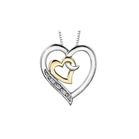 SILVER AND 10K GOLD PENDANT