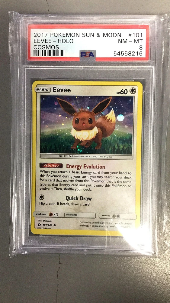2017 Pokemon Sun & Moon 101 Eevee-holo Cosmos PSA 8