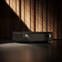 Aspirateur robot connecté Wi-Fi Roomba j9+ à vidange automatique d'iRobot (j955020) - Bronze rubis