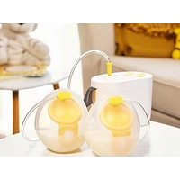 Tire-lait Pump In Style et gobelets collecteurs mains libres MaxFlow de Medela