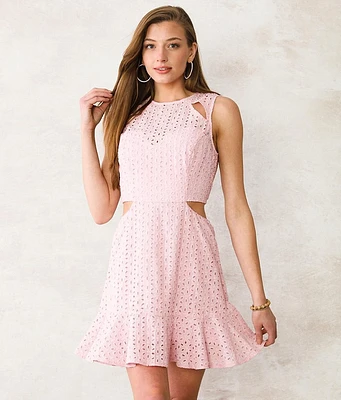A. Peach Eyelet Mini Dress
