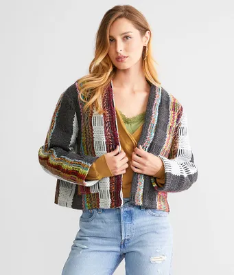 A. Peach Tweed Jacket