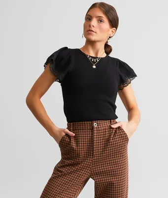 A. Peach Lace Trim Top