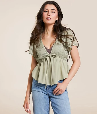 Daytrip Embroidered Peplum Top