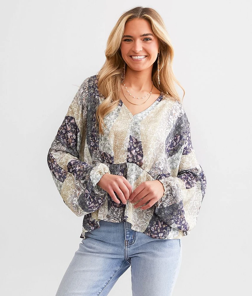 Floral Peplum Dolman Top
