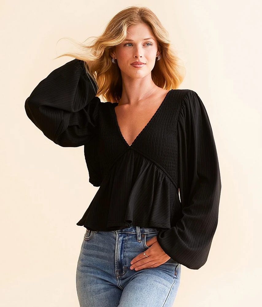 Cut-Out Back Peplum Top
