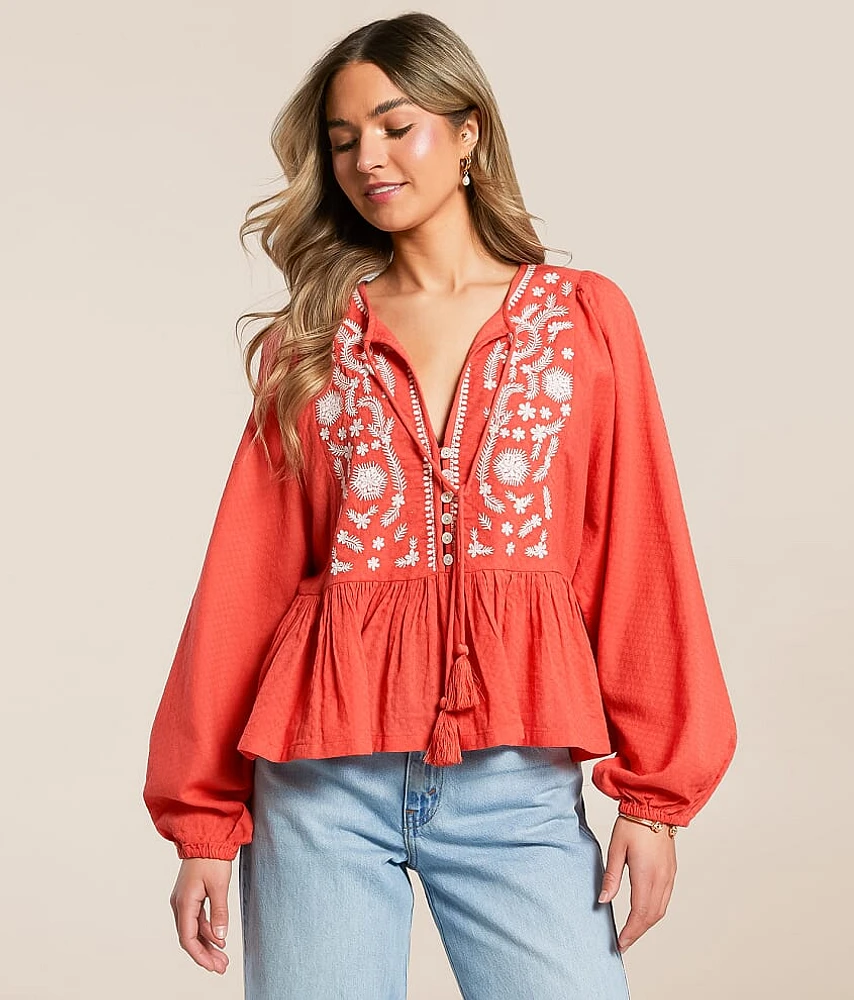 Embroidered Peplum Top