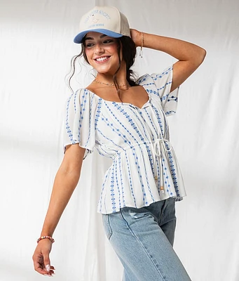 33 Coastal Floral Embroidered Peplum Top