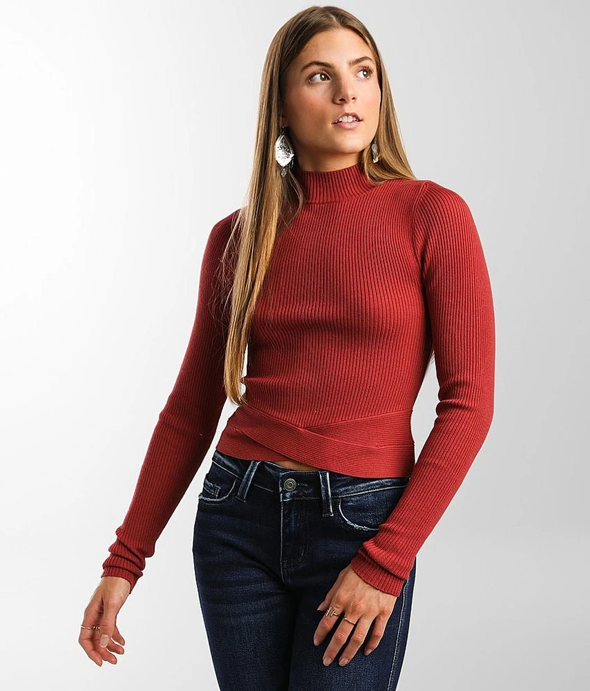 Fitted Cut-Out Hem Sweater